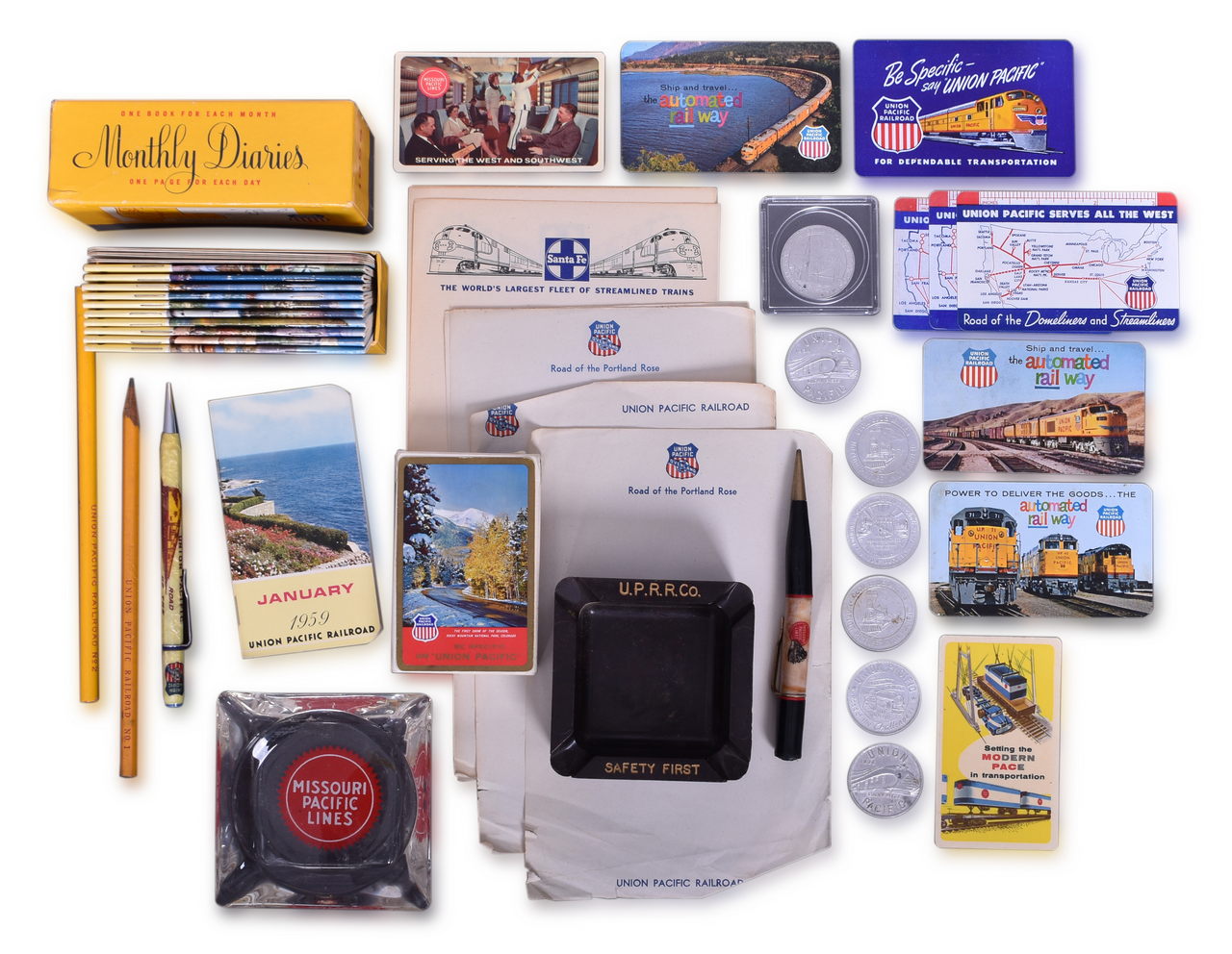 5278 - Mixed Lot of Older Railroad Ephemera - Union Pacific & Missouri Pacific - Alcoa Aluminum Coins, Ash Trays, Billfold, Pocket Calendars, Playing Cards, Monthly Diaries, and More thumbnail