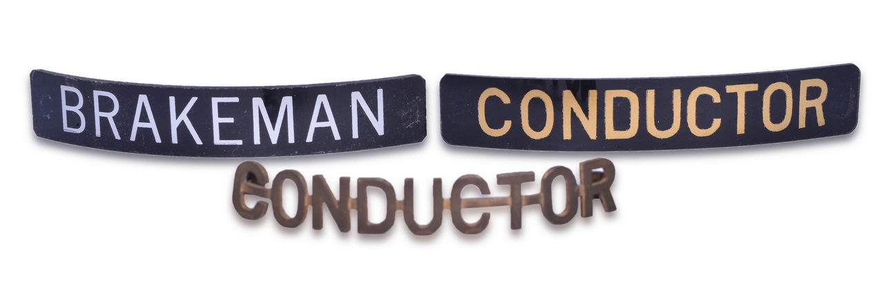 5286 - Twenty-Six Union Pacific Items - Conductor Buttons, Lapel Pins, Cap Badges, and Metal Baggage Tags thumbnail