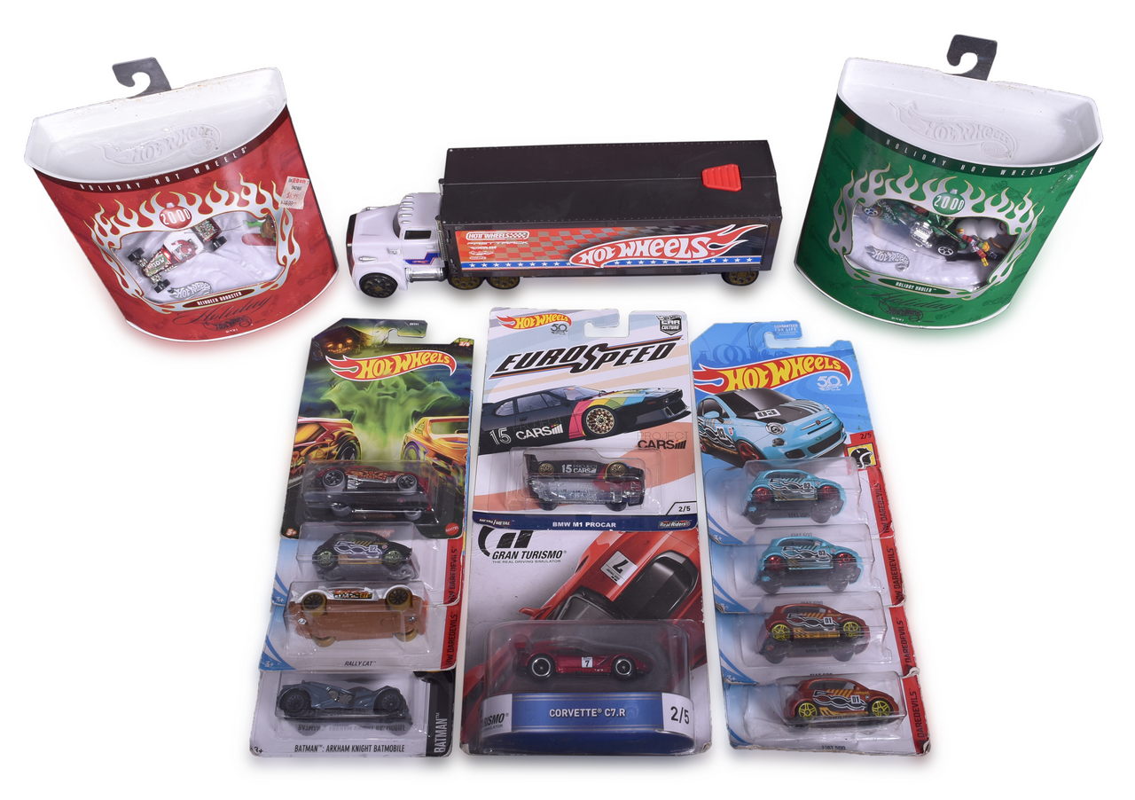 7036 - Thirteen Hot Wheels Die Cast Cars, Holiday 2000 Hauler, Reindeer Roadster, and Semi Trailer Dragster Case thumbnail