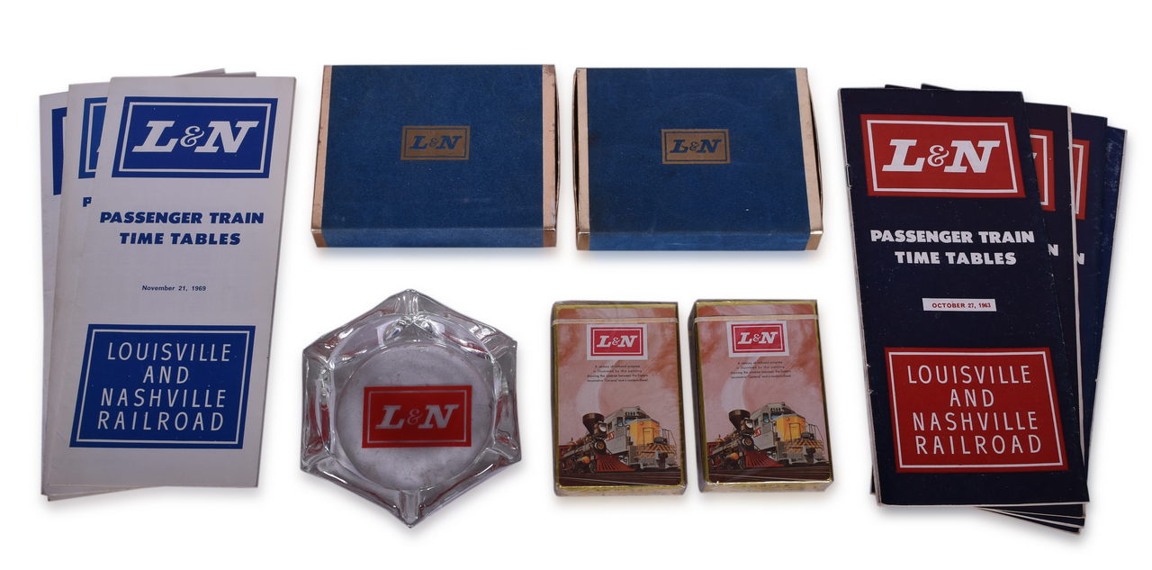 8001 - Mixed Group of Twelve Louisville & Nashville Railroad Ephemera - Playing Card Decks, Glass Ash Tray, and Public Timetables thumbnail