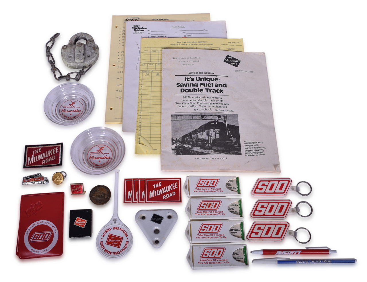 8042 - Twenty-Nine Pieces of Milwaukee Road and Soo Line Railroad Ephemera - Hiawatha Glass Ash Trays, Conductor Lapel Pin, Adlake Switch Lock, 1850 Anniversary Coin, Keychains, and More thumbnail