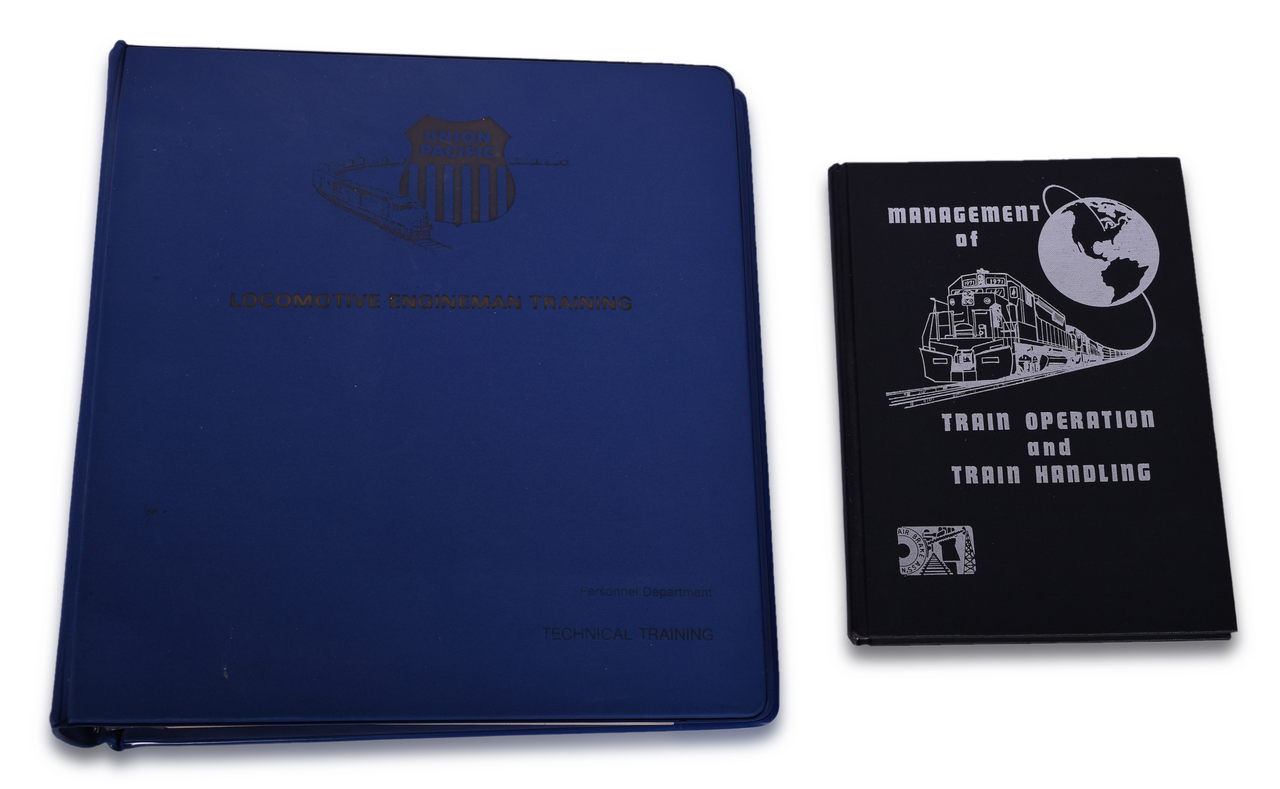 8608 - Two Railroad Training Books - Union Pacific Locomotive Engineman Training & Management of Train Operation and Train Handling thumbnail