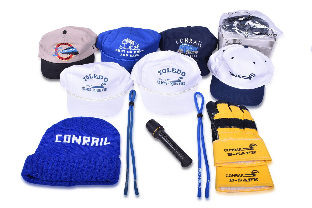 1085 - Fourteen Pieces Of Conrail Promotional Items - Hats, Gloves, Sunglasses, Flashlight, And Straps thumbnail