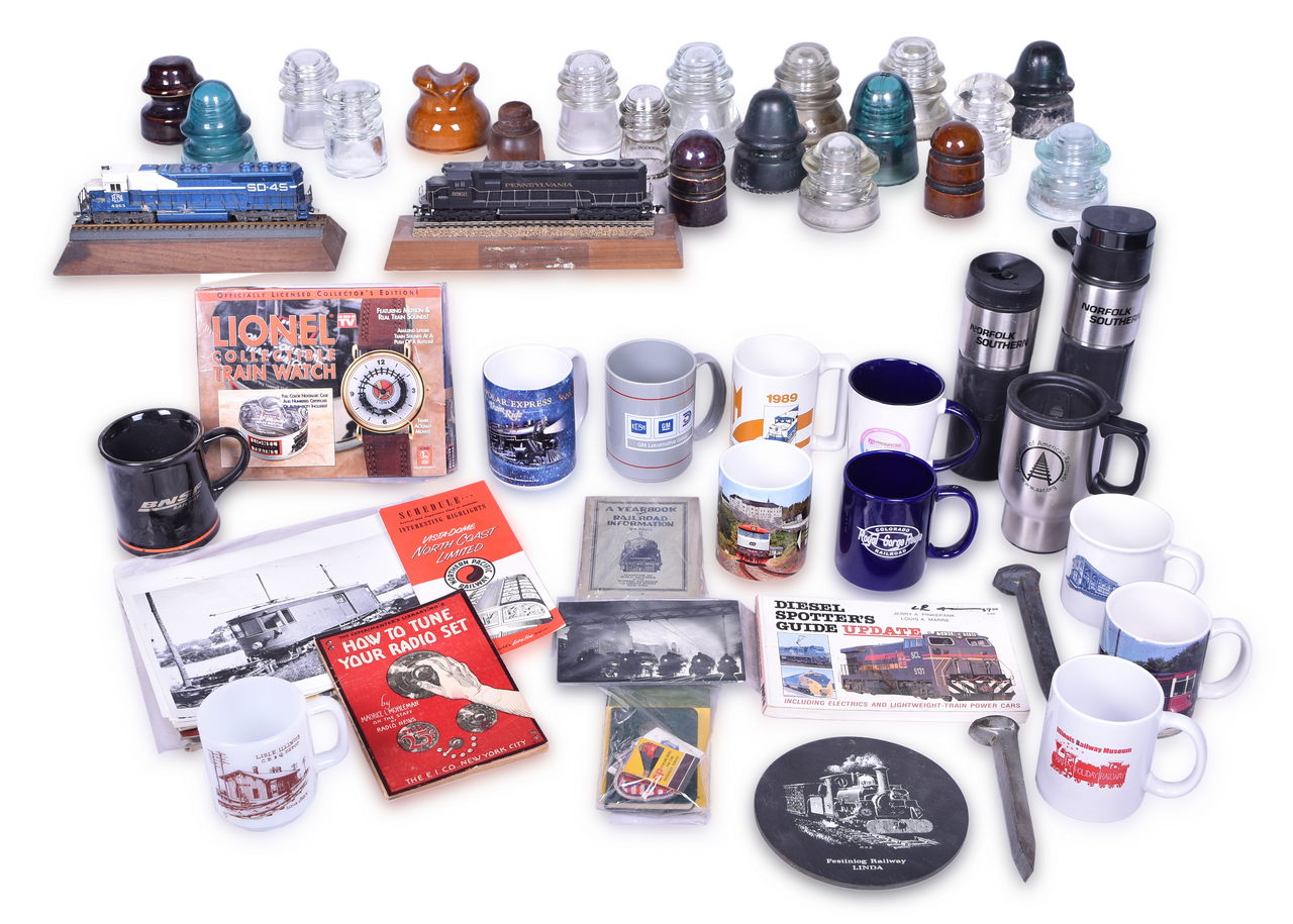 1187 - Over Sixty Assorted Railroad Items - Lionel Watch, Insulators, Guide Books, Desk Ornaments, Mugs, Photographs, And More thumbnail