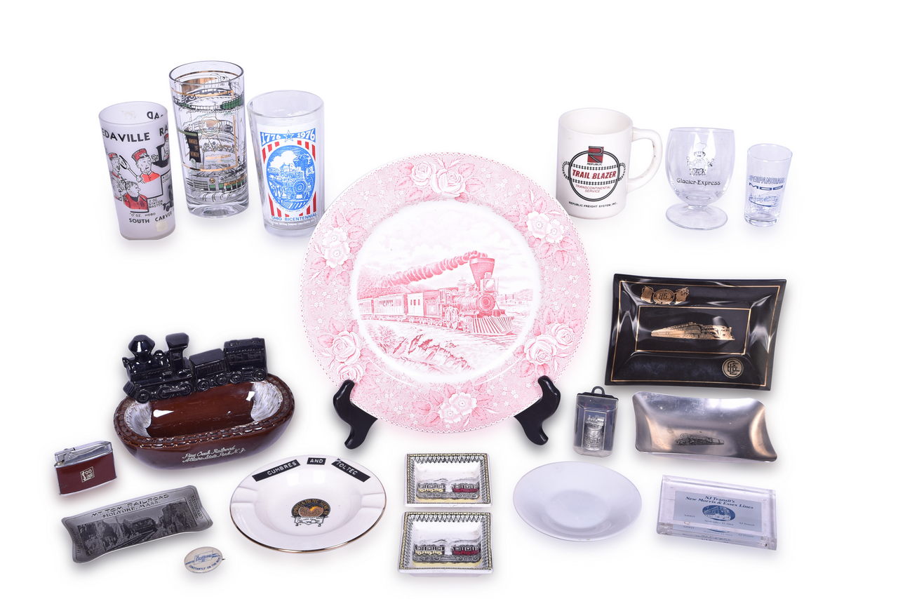 1234 - Nineteen Miscellaneous Railroad Items - China Plate, Glassware, Ashtrays, Lighter, Button, Thimble, and More thumbnail
