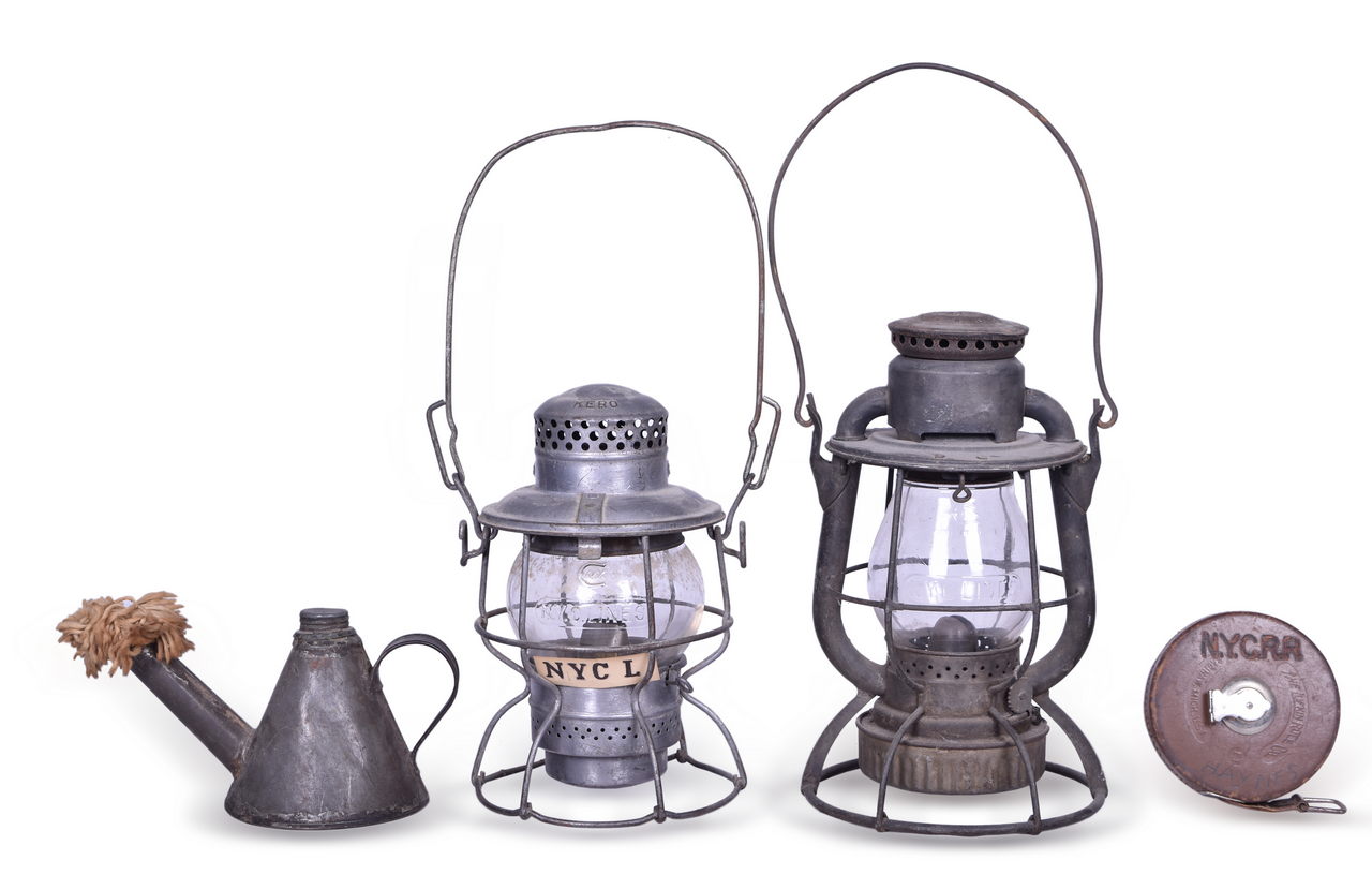 1274 - Group of New York Central Railroad Items - Adlake Kero Lantern, Dietz Vesta Lantern, Measuring Tape, and Unmarked Hand Torch Pot thumbnail