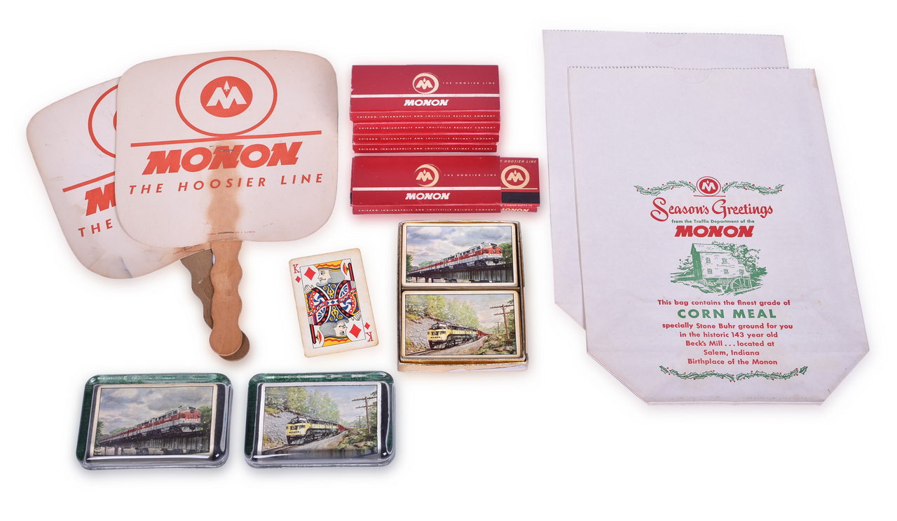 2280 - Monon Railroad Glass Paperweights, Matches, Playing Cards, Corn Meal Bags, and More thumbnail
