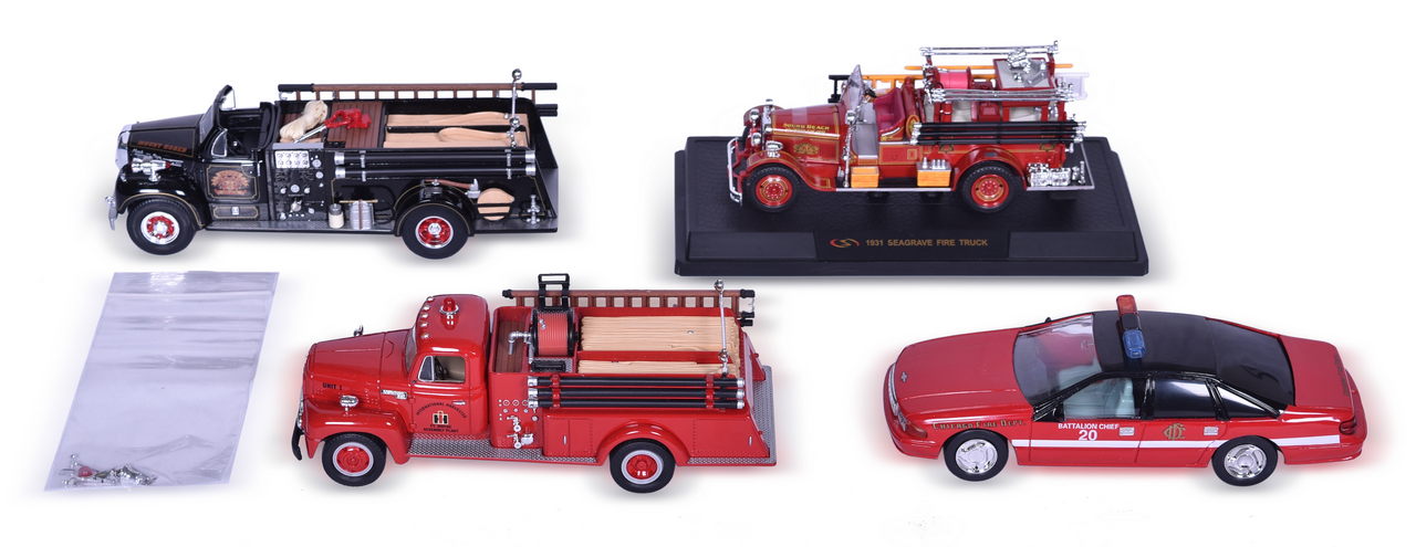 3470 - Four Die Cast Fire Trucks and Battalion Chief Car - First Gear International Harvester, B-Model Mack, Seagrave Fire Truck, and Chevrolet Caprice thumbnail