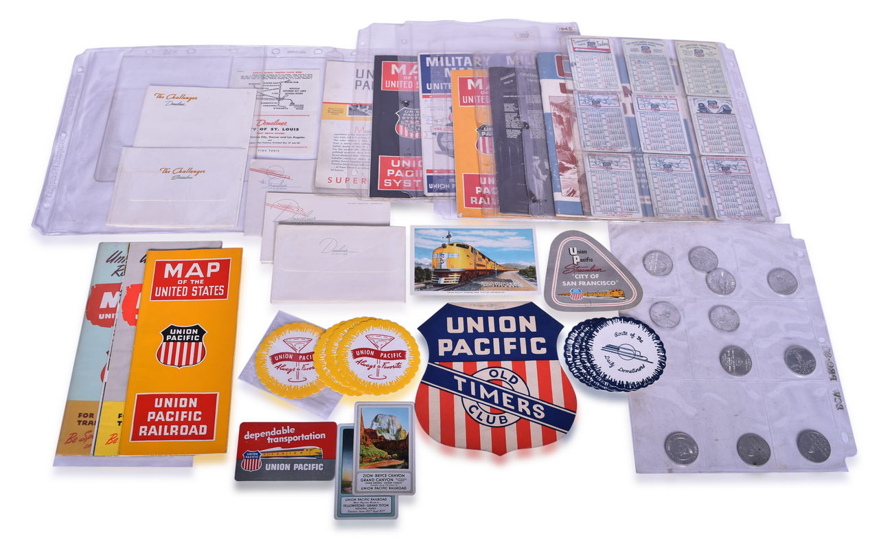 4202 - 52 Pieces of Union Pacific Railroad Ephemera - Pocket Calendars, Maps, Aluminum Coins, etc thumbnail