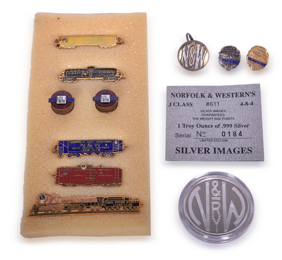 5051 - Group of Norfolk and Western Railroad Lions Club and Veterans Pins, Uniform Button, and Silver Coin thumbnail