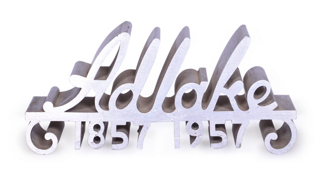 5280 - Adlake Centennial 1857-1957 Aluminum Extrusion Desk Ornament thumbnail