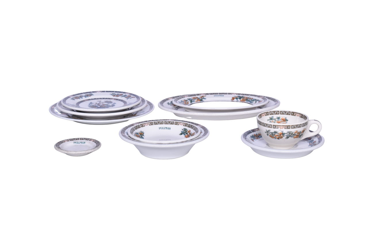 6251 - Ten Pieces of Pullman and Unmarked Indian Tree China - Butter Pat, Plates, Oval Platters, Fruit Bowl, Bowl, Cup, and Saucer thumbnail