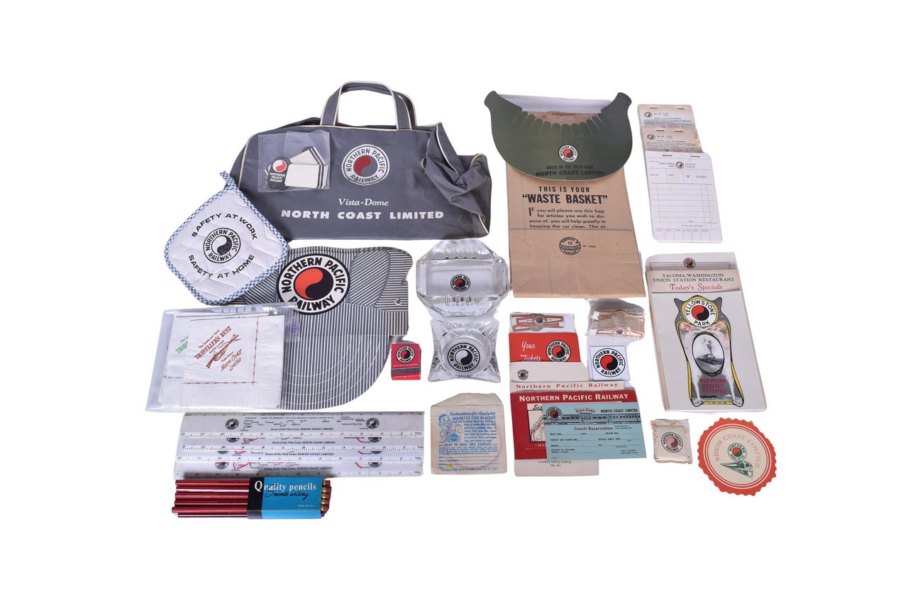 971 - Assorted Northern Pacific Railway Ephemera - Ashtrays, Souvenir Bag, Cigar Bands, Waste Bags, Coasters, Matchbooks, and More thumbnail