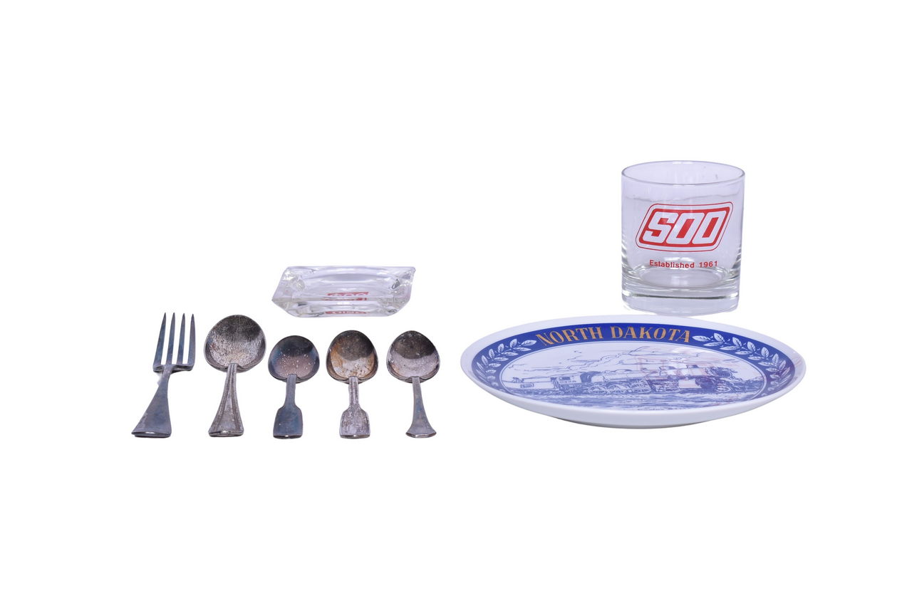 1261 - Eight Pieces of Soo Line Railroad Flatware, Glass Ashtray, Drinking Glass, and Centennial Plate thumbnail