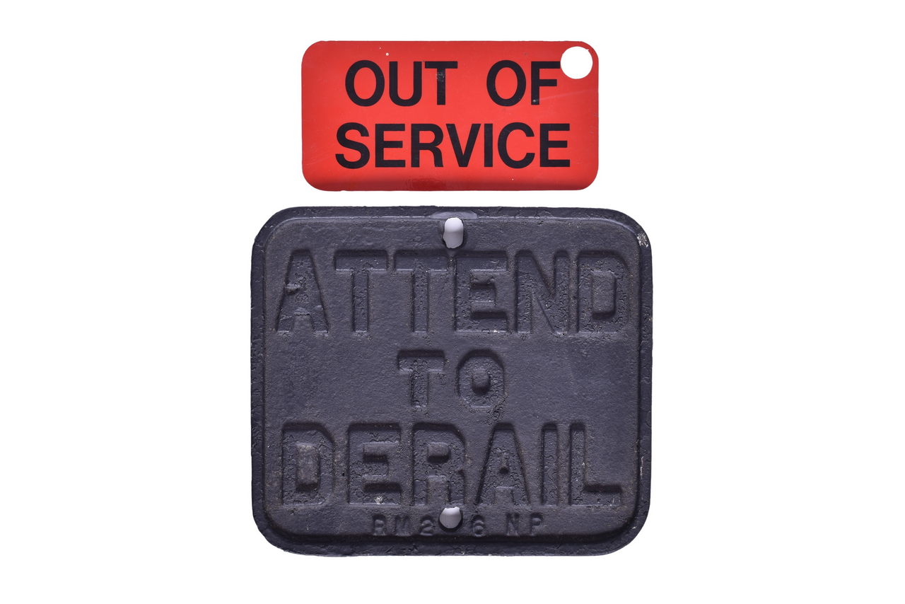 1408 - Cast Iron Northern Pacific Railroad Attend to Derail Sign and Aluminum Out Of Service Sign thumbnail