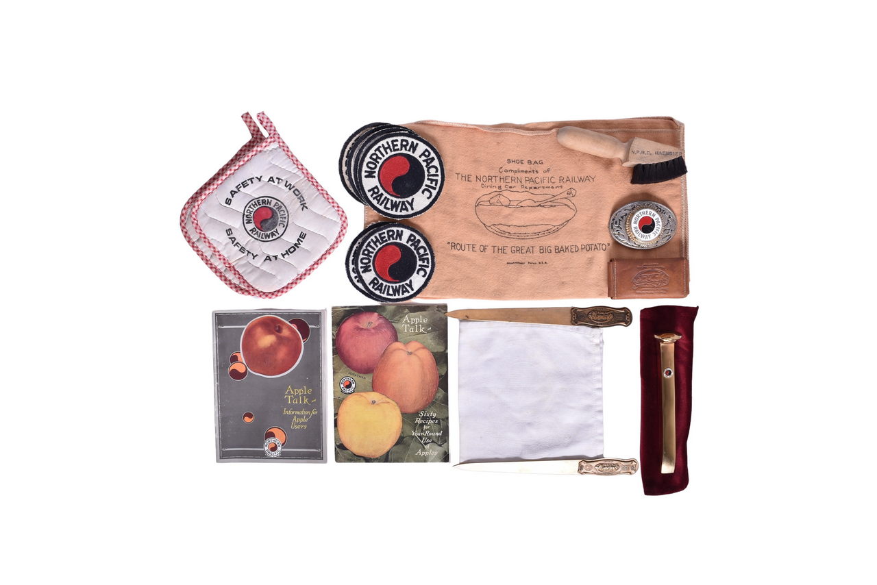 1593 - Group of Northern Pacific Railroad Ephemera - Shoe Bag, Brush, Great Big Baked Potato Letter Openers, Patches, Etc. thumbnail