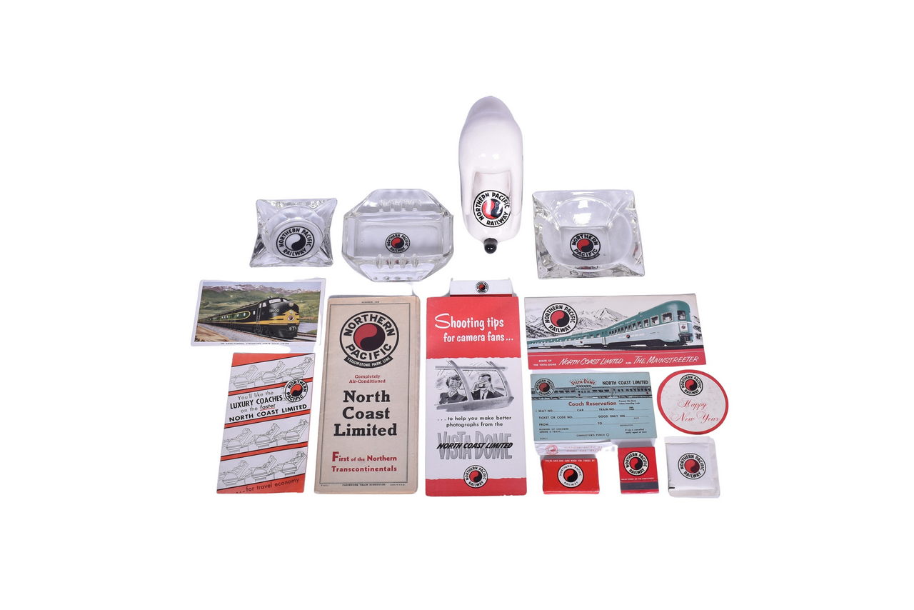 1693 - Group of Northern Pacific Railroad Ephemera - Snoopy Statue, Ashtrays, Postcard, 1939 Timetable, and More thumbnail