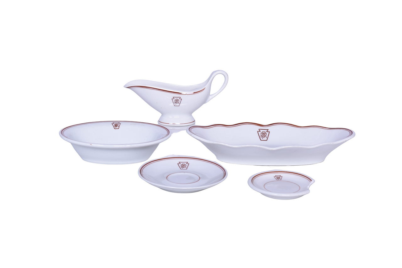 2067 - Five Pieces of Pennsylvania Railroad Keystone China Oval Celery Tray, Gravy Boat, Saucer, Bakers Dish, and Butter Pat thumbnail