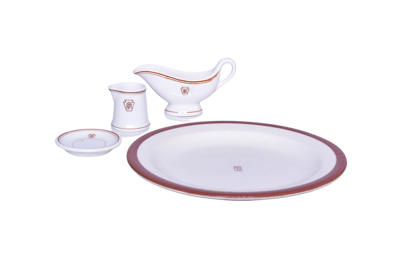 3043 - Four Pieces of Pennsylvania Railroad China Gotham Service Plate, Keystone Creamer, Sauce Boat, and Butter Pat thumbnail
