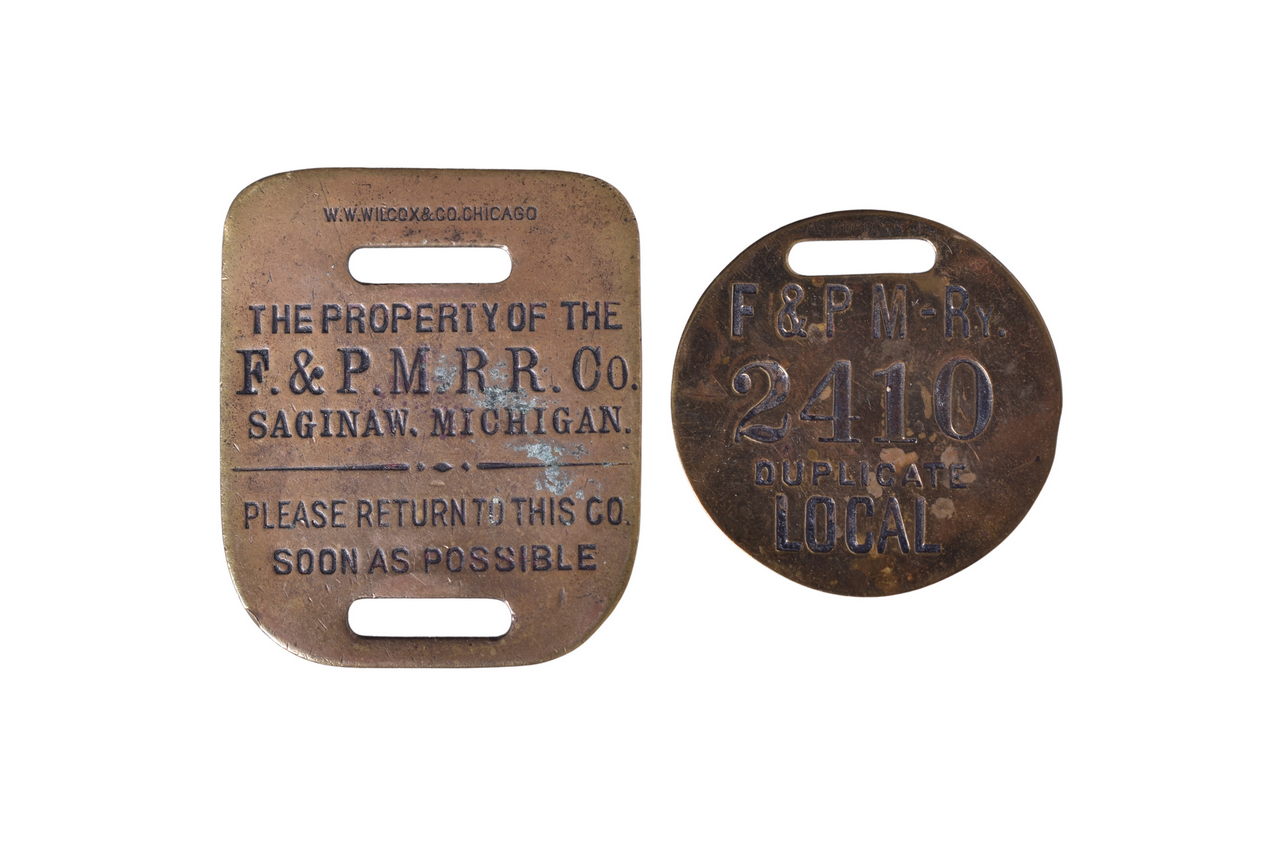 3217 - Pair of Flint & Pere Marquette Railroad Brass Luggage Check Tags - Duplicate Local and Property Saginaw thumbnail