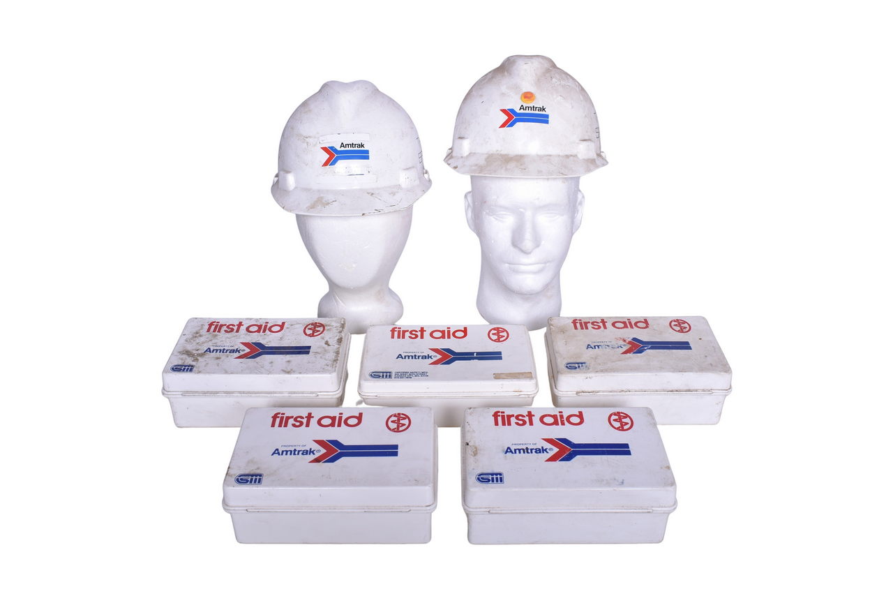 3698 - Two Amtrak Hard Hat and Five Amtrak First Aid Kits thumbnail