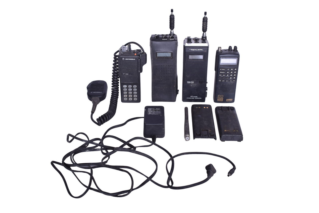 5129 - Group of Railroad Radio Transceiver Handsets and Battery Packs - Realistic, Motorola, and Uniden Bearcat thumbnail