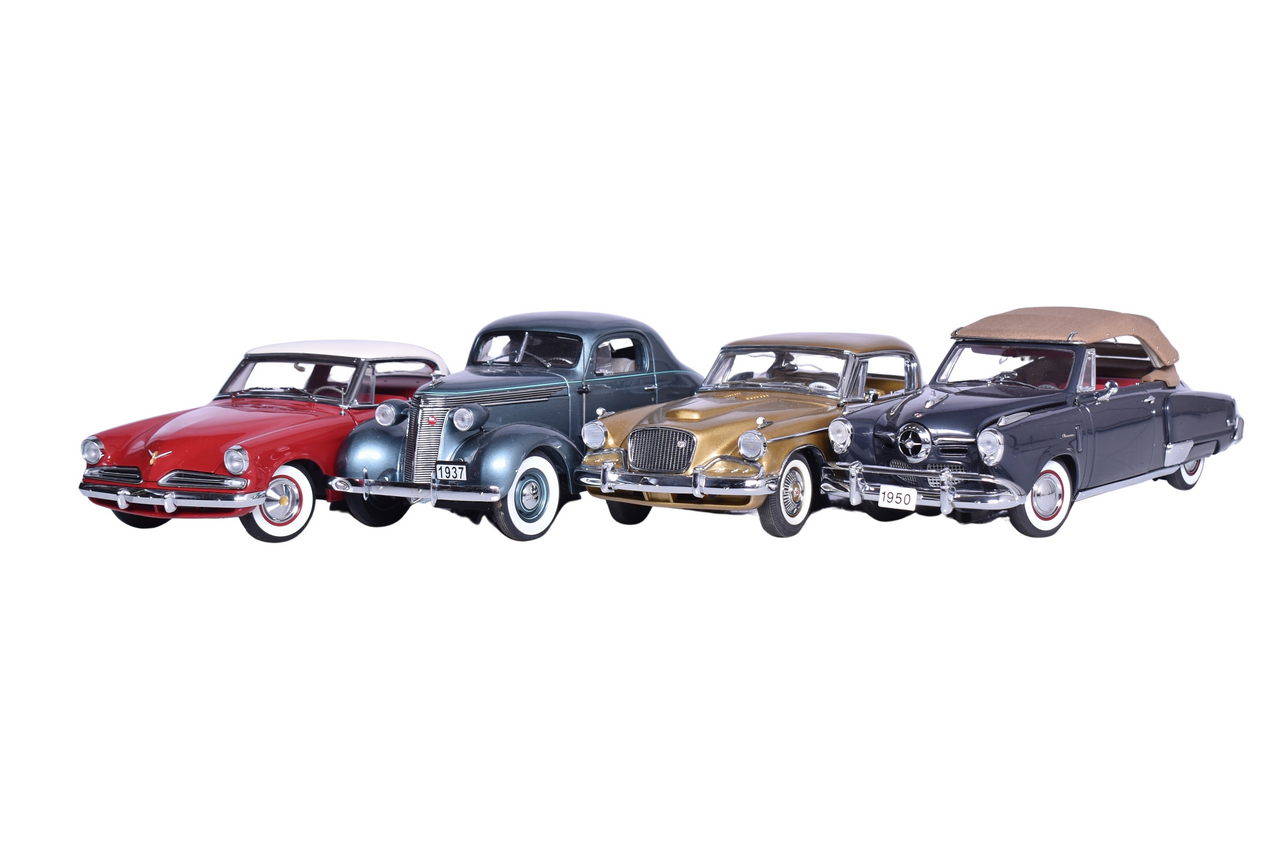 3261 - Four Danbury Mint 1:24 Die Cast Studebaker Models - Commander Starliner, Dictator Coupe, Champion Convertible, Golden Hawk thumbnail