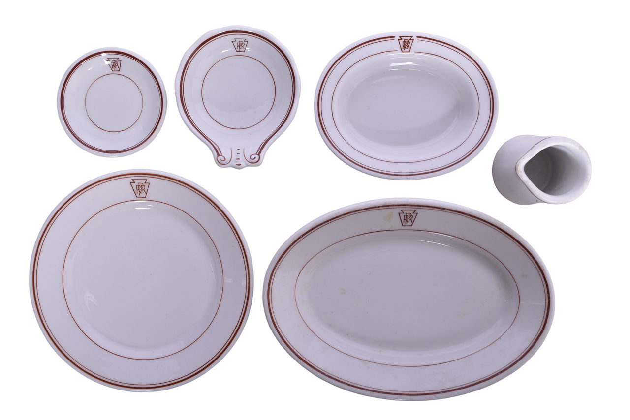 6417 - Six Pieces of Pennsylvania Railroad Keystone China Creamer, Ice Cream Shell, Oval Platter, Bakers Dish, Butter Pat, and Plate thumbnail