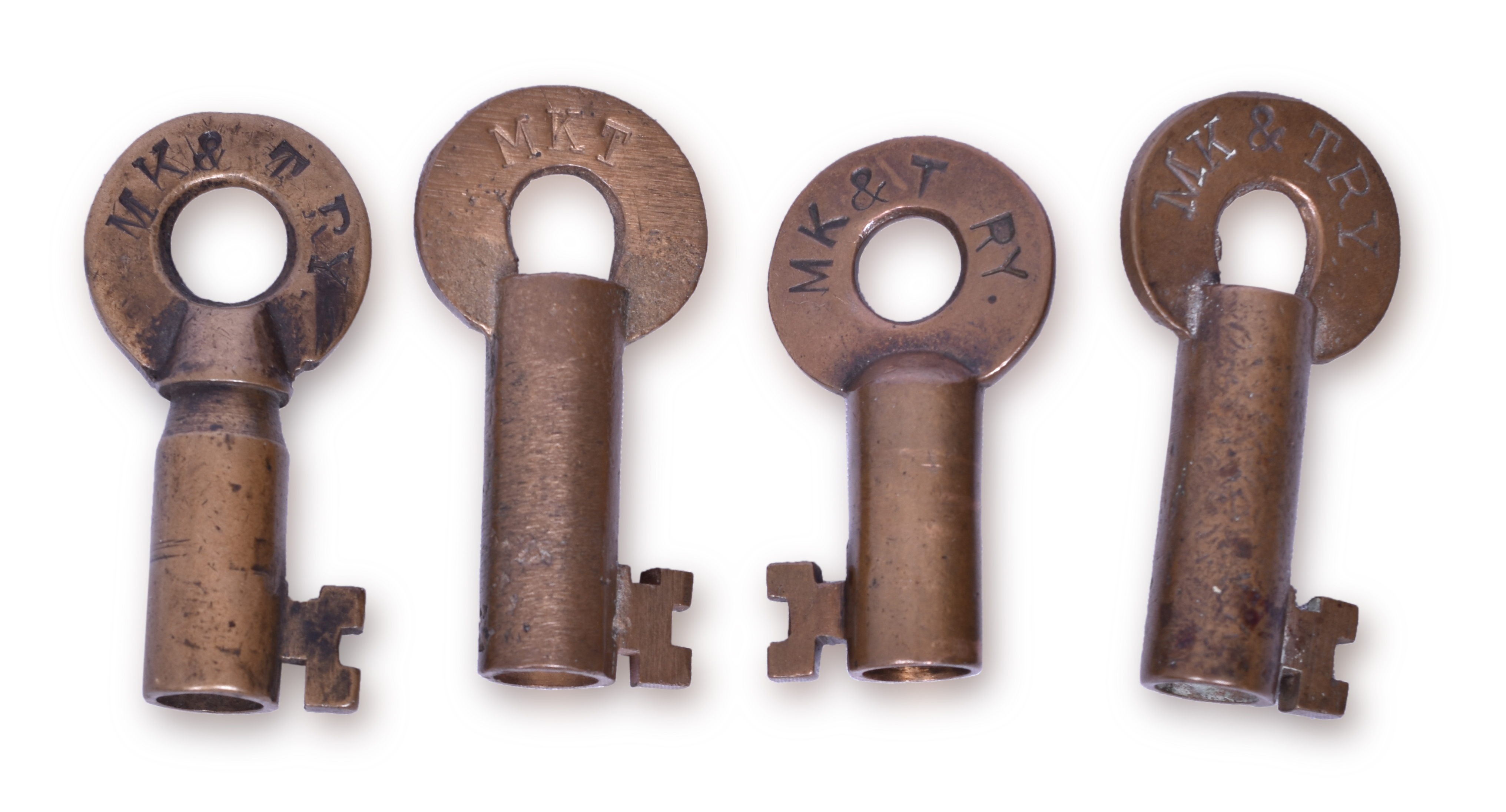 2054 - Four Missouri, Kansas and Texas Railroad Brass Keys - Serif Font, Choke Barrel thumbnail