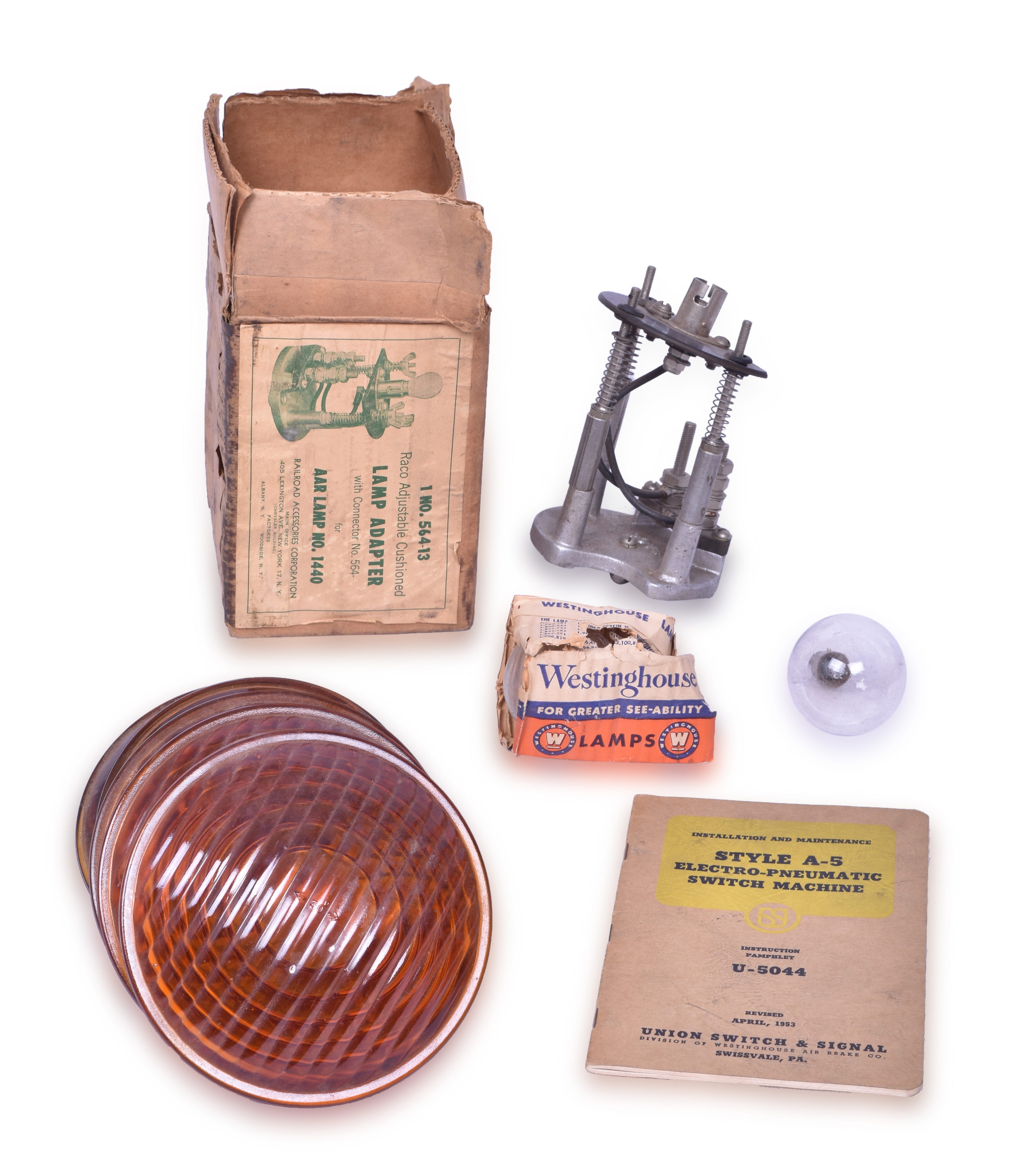 2428 - Railroad Signal Parts Lot - RACO Lamp Adapters, Lenses, US&S A-5 Manual, Westinghouse Bulbs thumbnail
