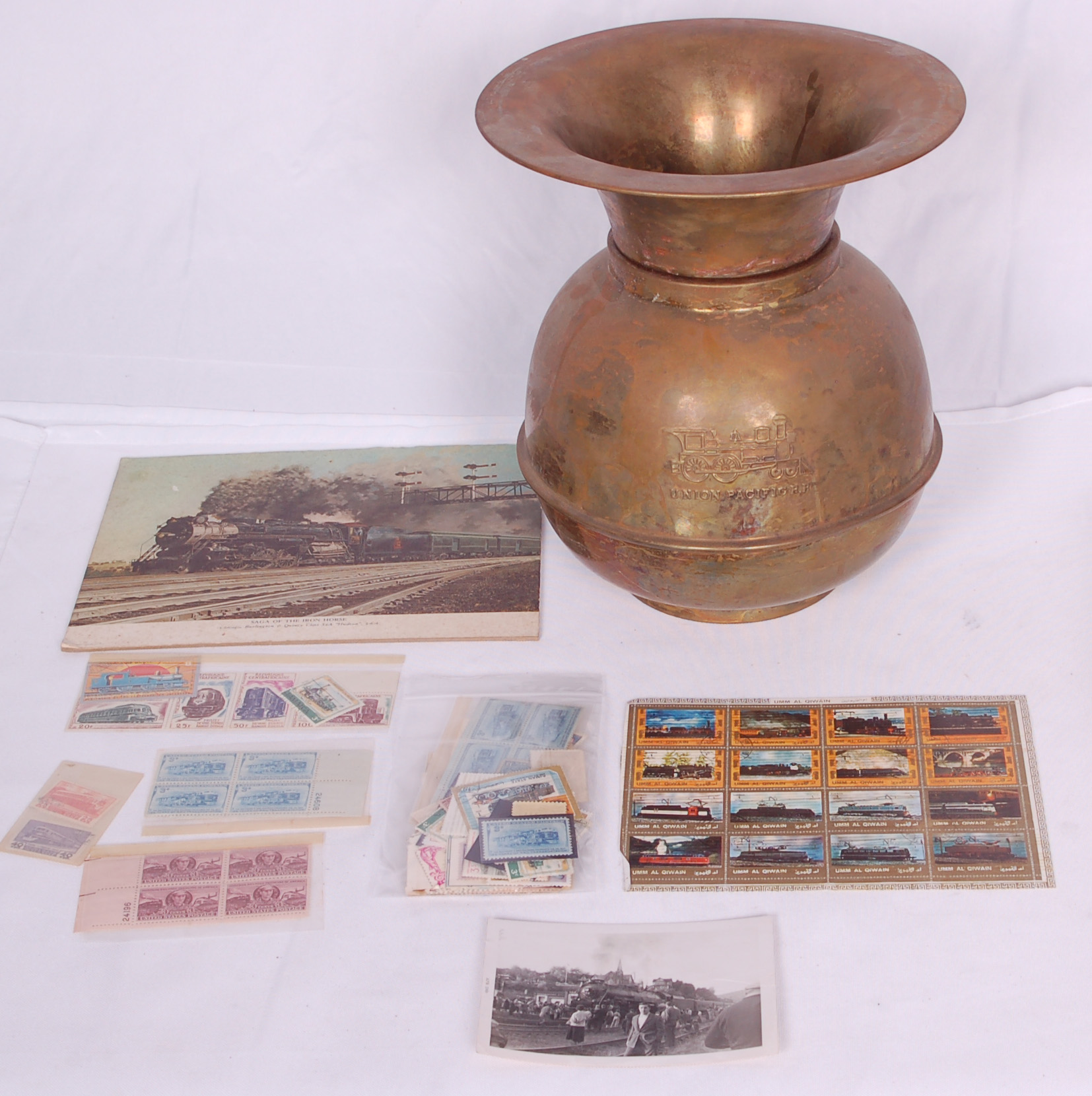 263 - Group of misc. railroadiana - Union Pacific Spitton, Collection of Railroad Stamps, and More thumbnail