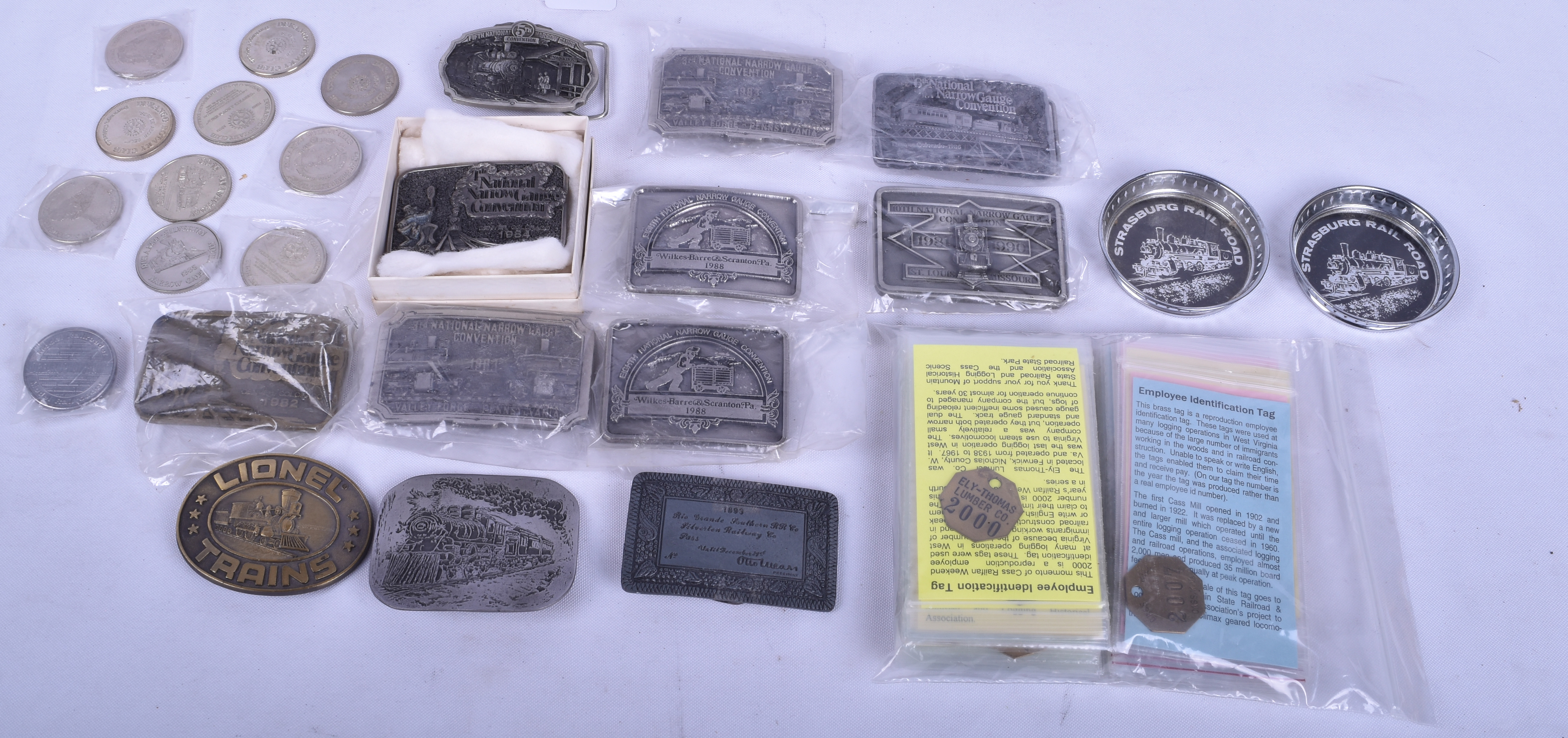446 - Group of Railroad Belt Buckles, Durango Silver Coins, and Reproduction ID tags thumbnail