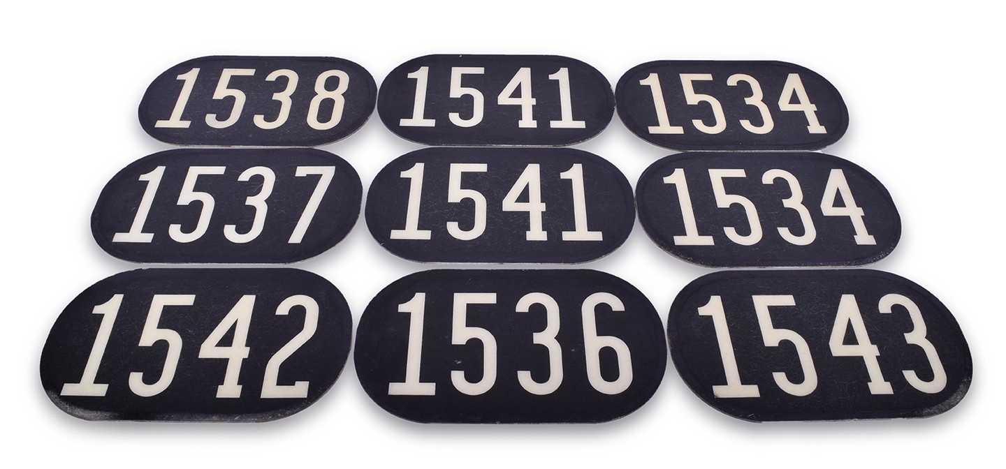 95 - Group of Nine Unidentified SW / MP Style Switcher Locomotive Number Boards thumbnail