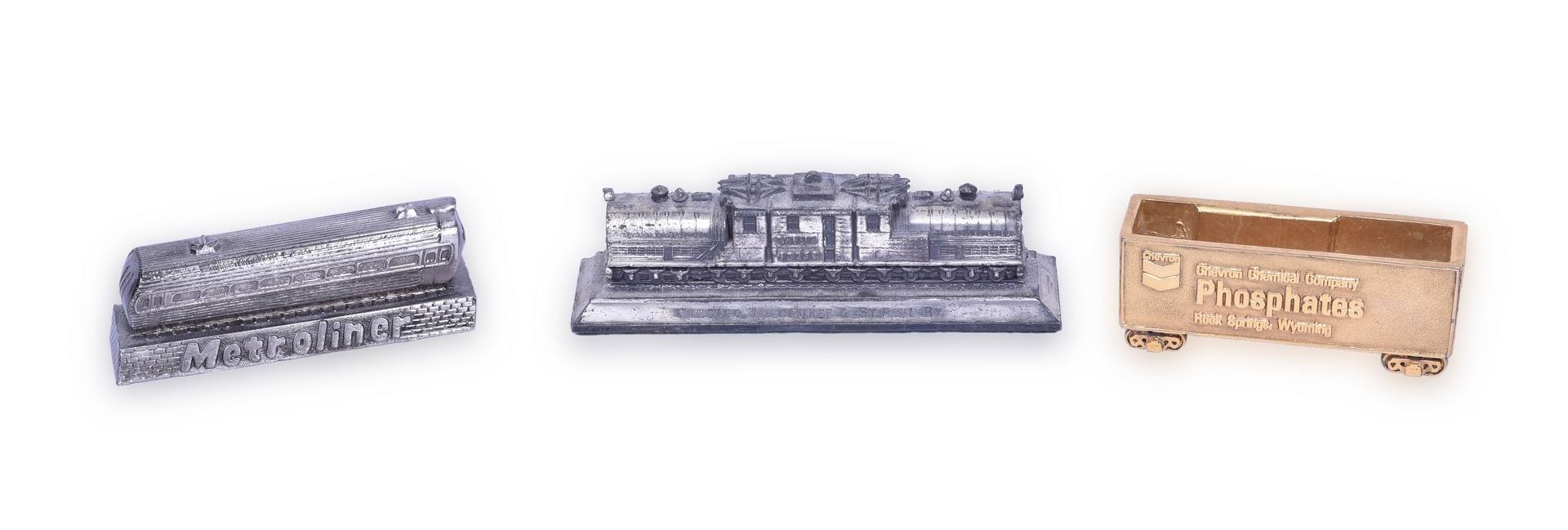 74A - Group of Three Railroad Paperweights - Milwaukee Road Bi-Polar, Penn Central, and Union Pacific thumbnail