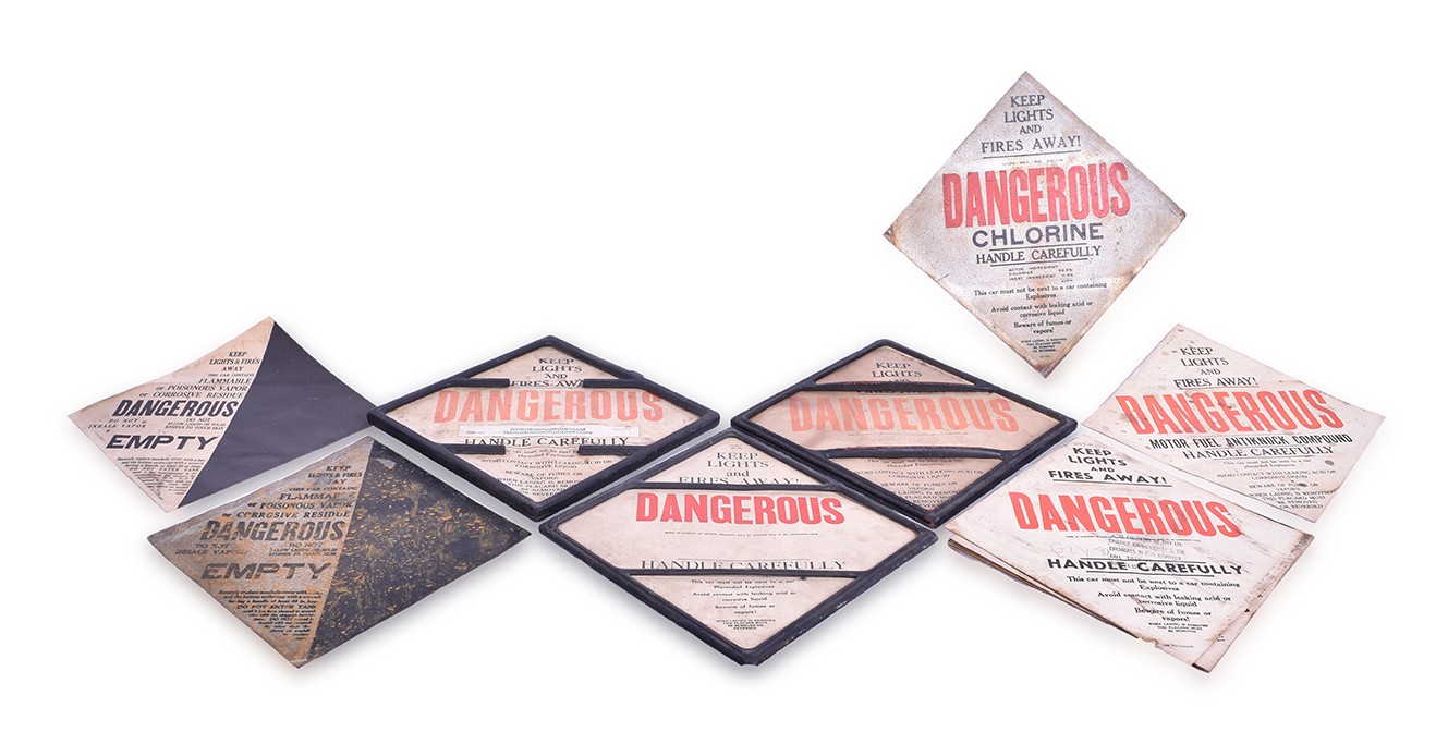 423 - Twelve Railroad Tank Car Placards and Three Steel Frames thumbnail