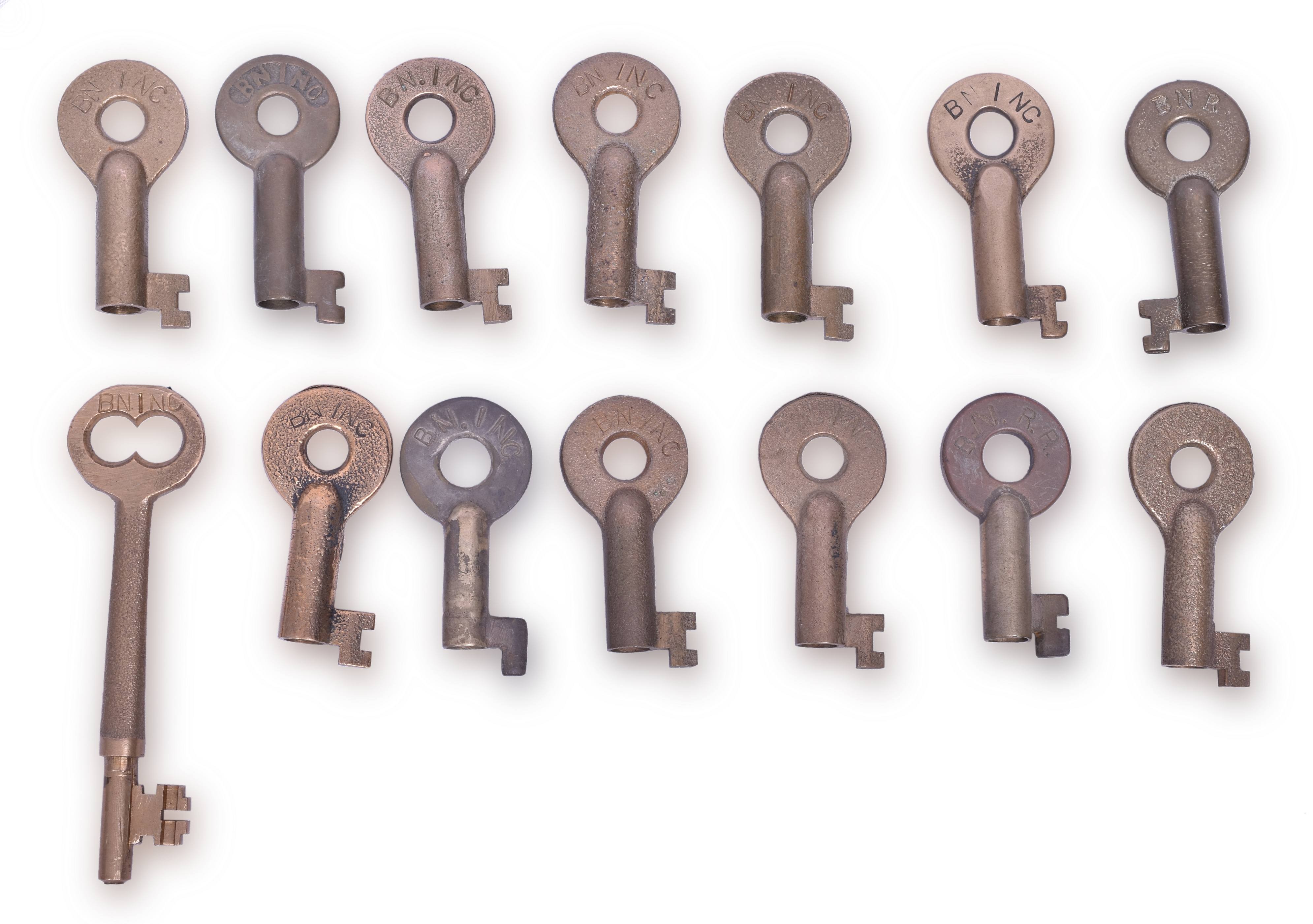 4058 - Group of Fourteen Burlington Northern Railroad Brass Keys thumbnail