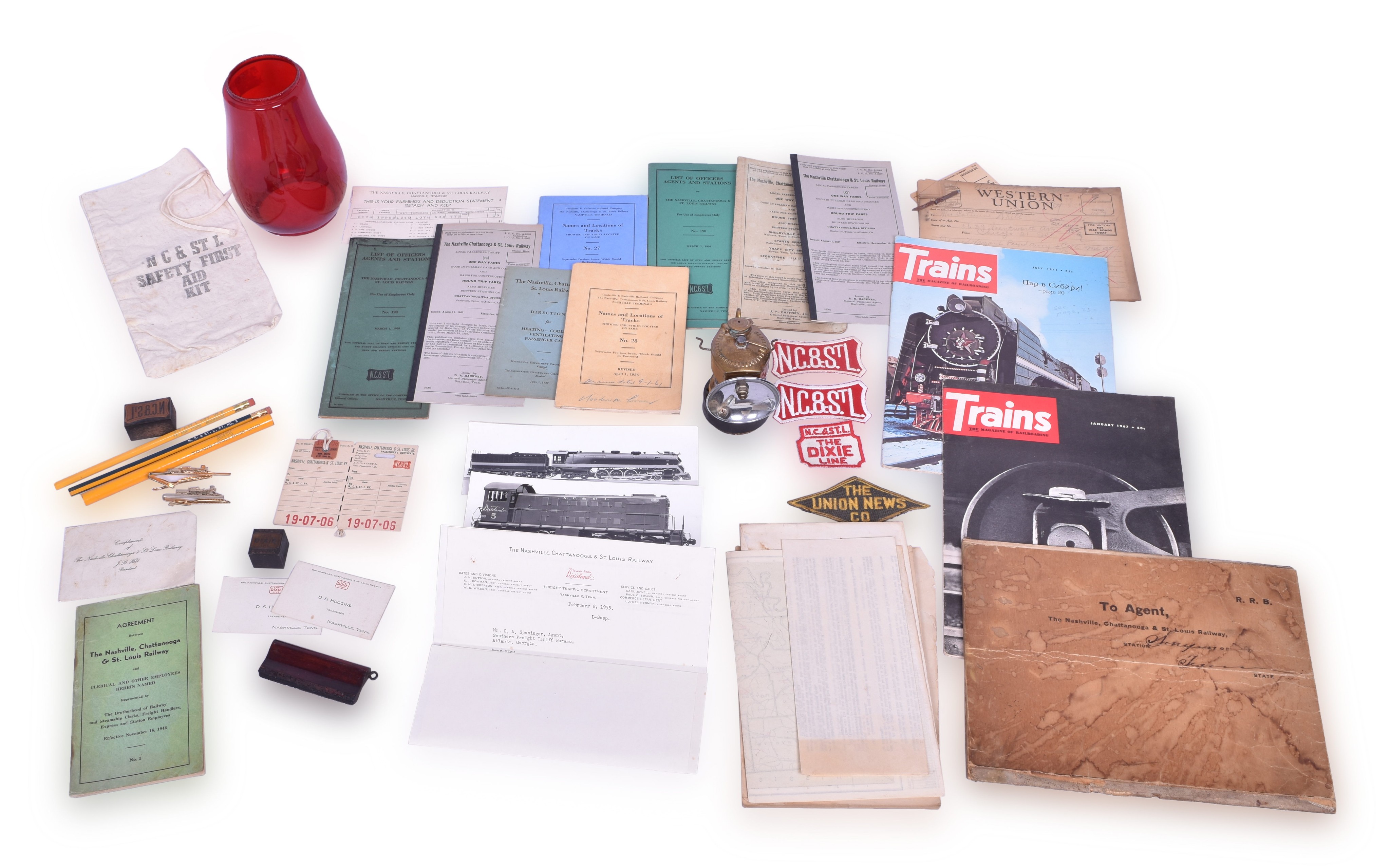 159 - Mixed group of Nashville Chattanooga & St. Louis Railway Railroadiana - ALCO Builders Cards, Station Agent Book, First Aid Bag, etc. thumbnail