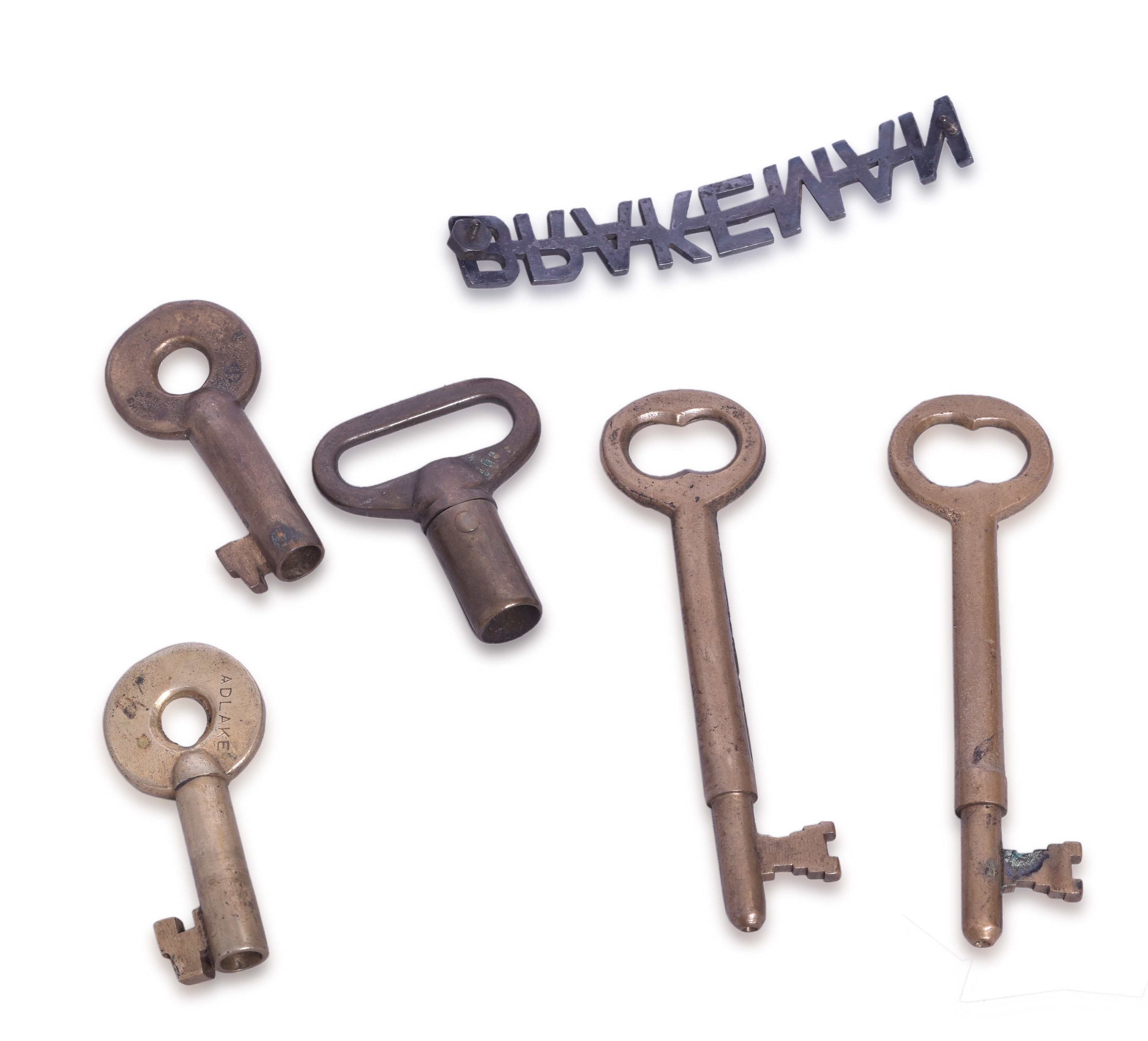 381 - Southern Pacific Railroad A&W and Adlake Keys, Coach Keys, and Brakeman's Cap Badge thumbnail