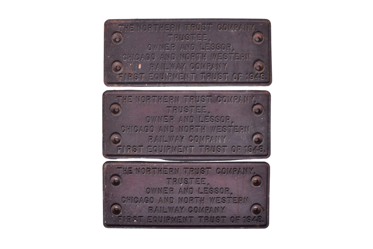 3240 - Group of Three 1948 C&NW Cast Iron Trust Plates thumbnail